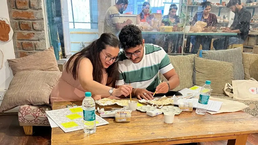Participants working together on a creative activity